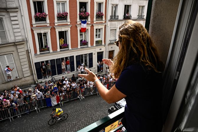 A spectator watches the women's cycling road race on August 4.