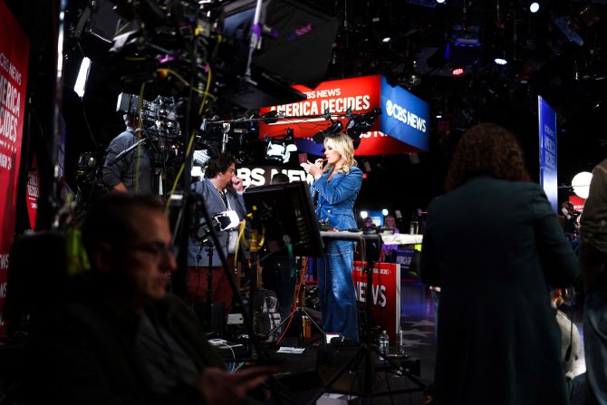 Journalists prepare in the spin room before the debate.