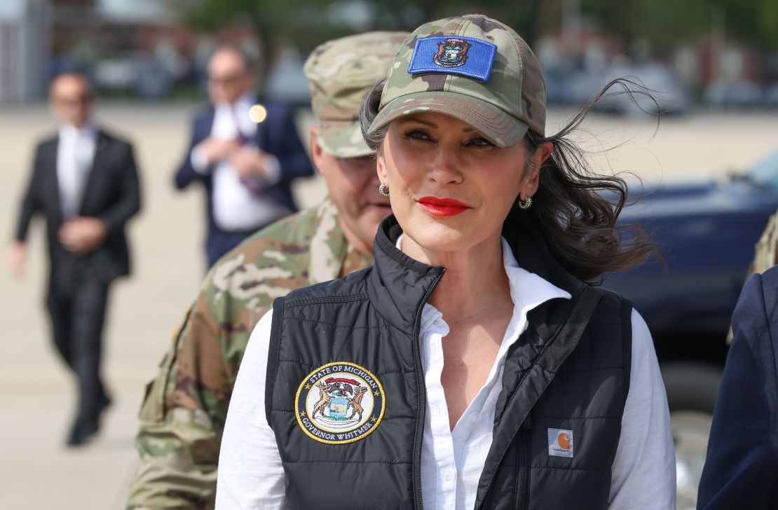 Michigan Gov. Gretchen Whitmer arrives to greet President Donald Trump before he speaks to Air National Guard Troops at Selfridge Air National Guard Base, Michigan, on April 29, 2025.