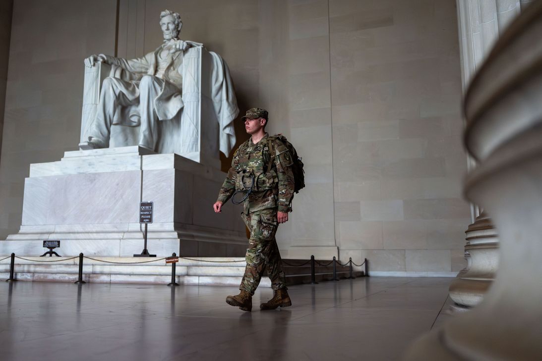A National Guardsman walks past the Lincoln Memorial while patrolling the National Mall, on September 4, 2025.