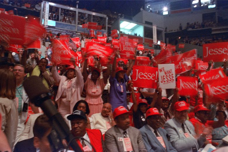 Jesse Jackson supporters raise and wave signs during the 1988 Democratic National Convention in Atlanta.