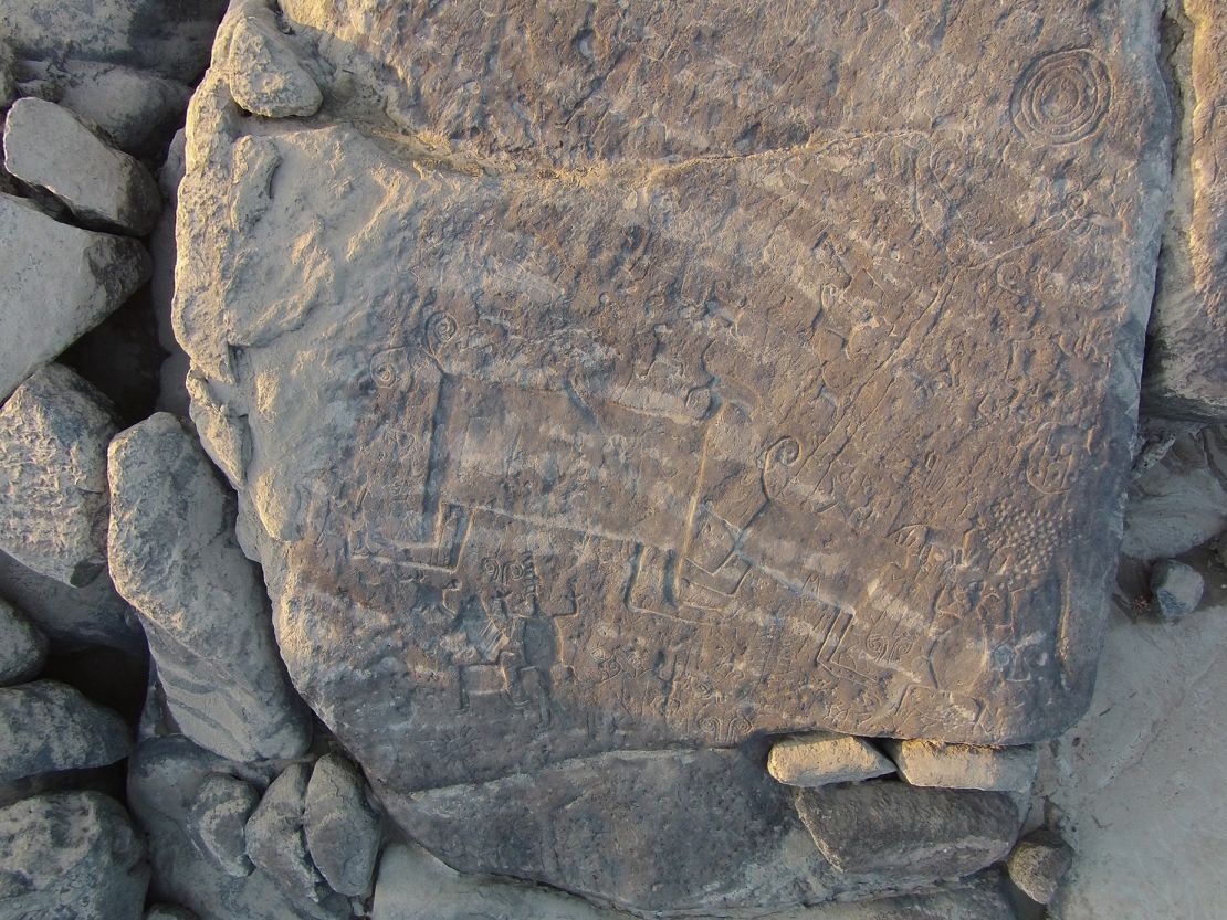 A close-up shows a detail of rock art on Picure Island, Venezuela.