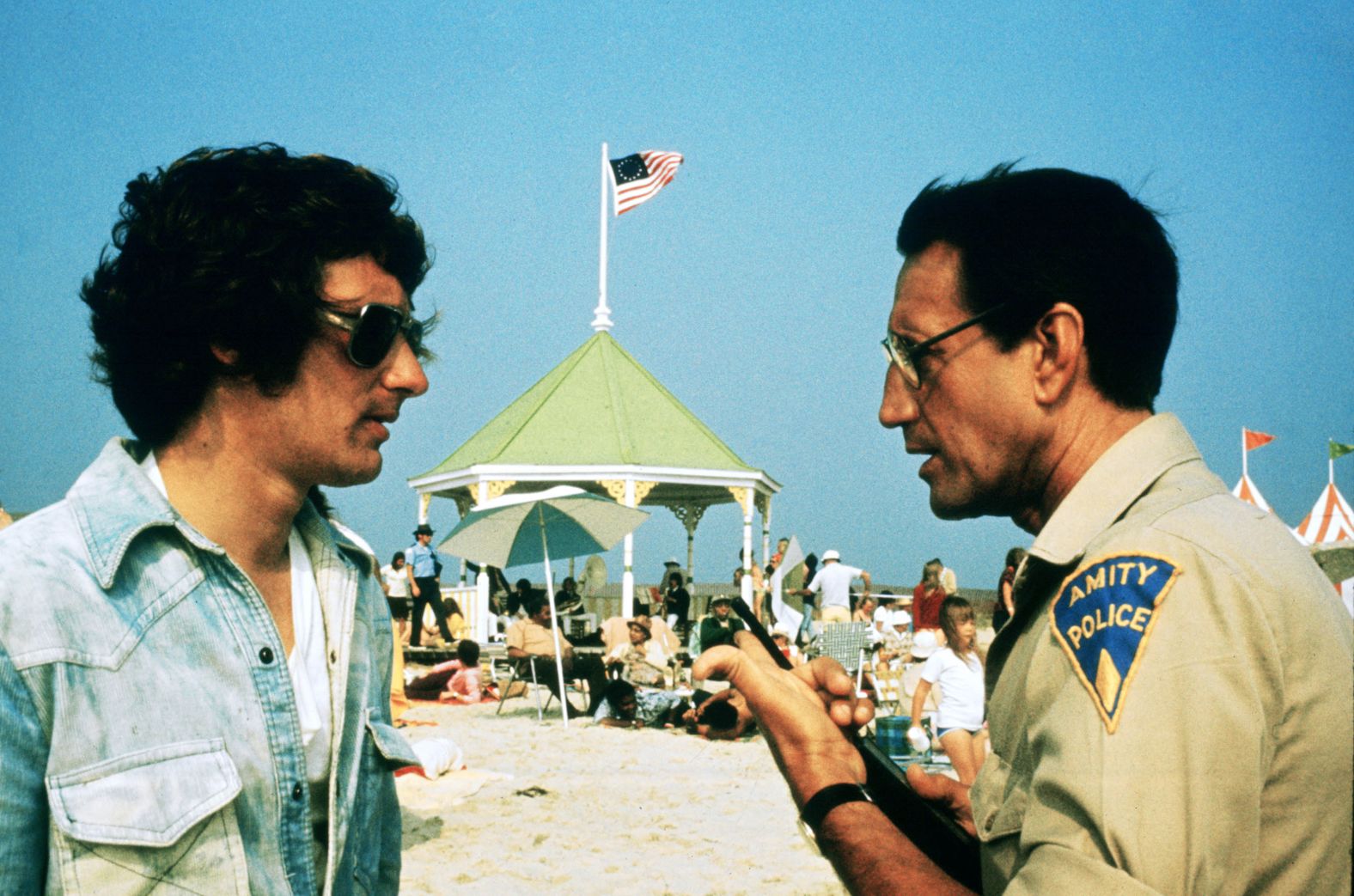 Spielberg, left, and Scheider discuss a scene set on a crowded beach on Amity Island. The beaches of Martha's Vineyard stood in for the fictional locale.