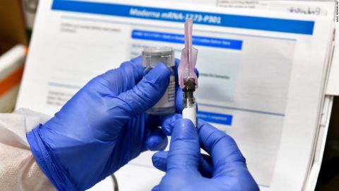 A nurse prepares a shot during a study of a possible COVID-19 vaccine developed by the National Institutes of Health and Moderna Inc. on Monday, July 27, 2020, in Binghamton, N.Y. 