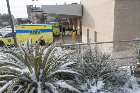 Emergency Medical Services workers load ambulances at Saint David's Medical Center in south Austin, Texas, after the hospital suffered water problems along with large swaths of the Austin metro area on February 18.