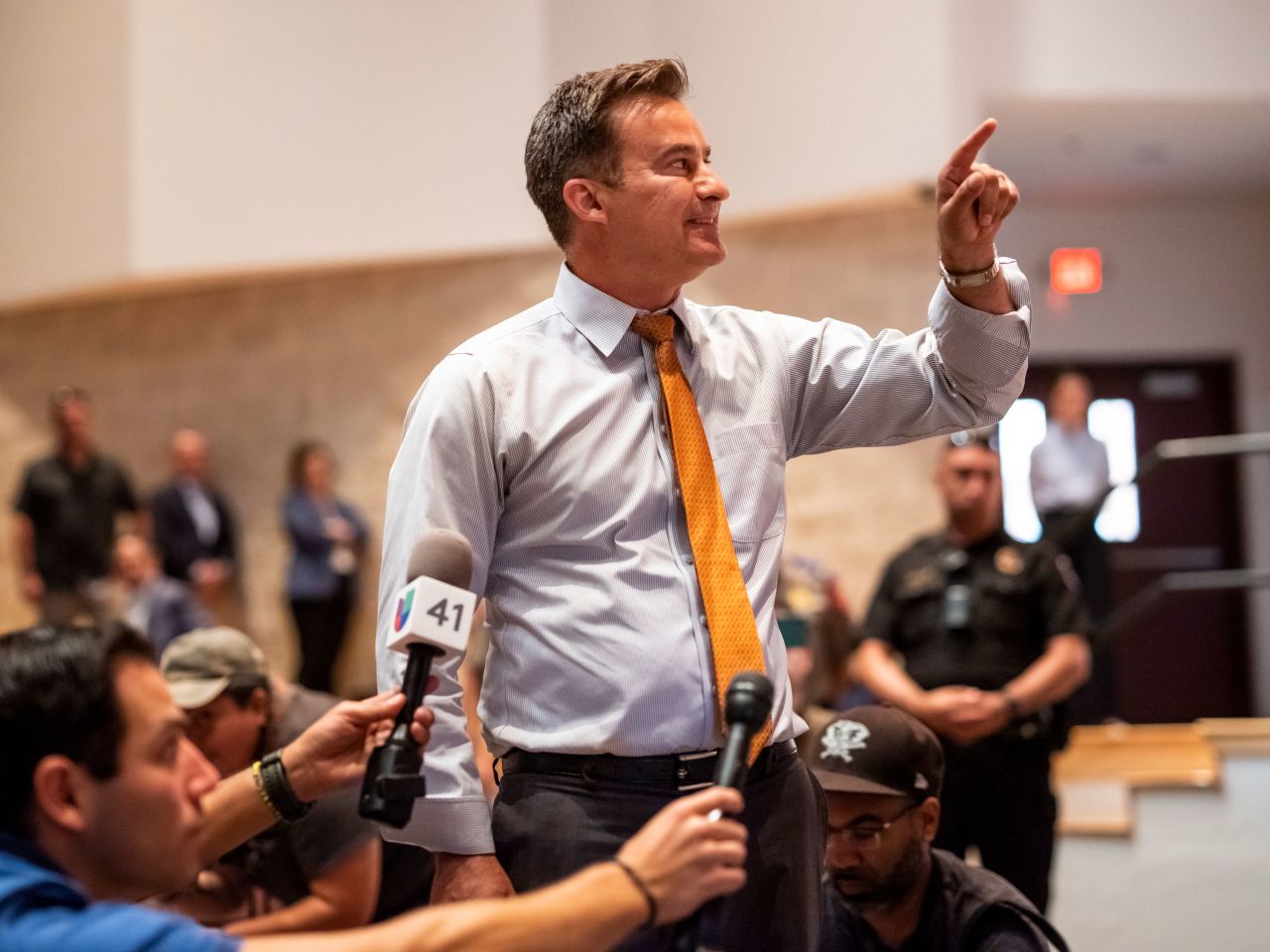 Texas state Sen. Roland Gutierrez interrupts Texas Governor Greg Abbott during a press conference in Uvalde, Texas, on Friday, May 27. 