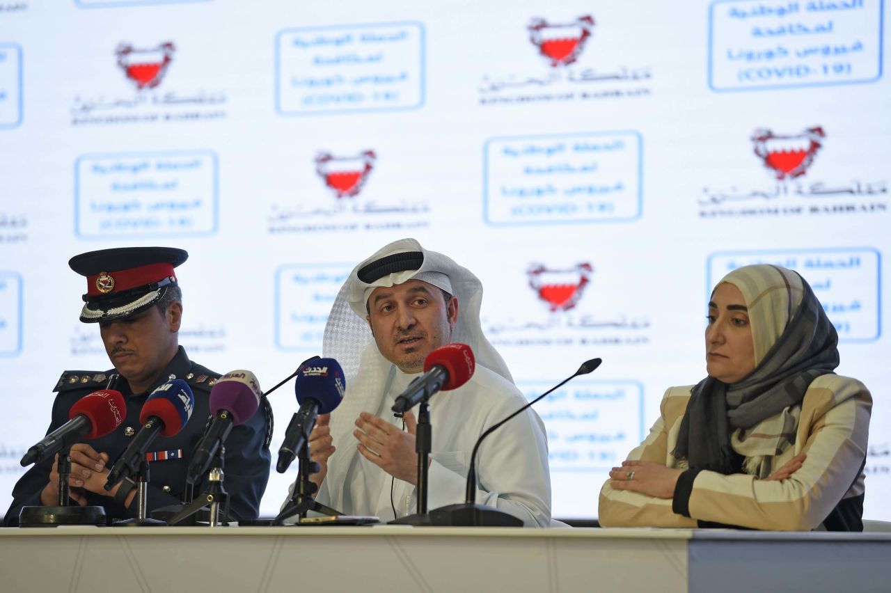 From left: Lieutenant Colonel Mohammed al-Benghdair, chief executive of the National Disaster Commission, and COVID-19 Task Force members Manaf al-Qahtani, alongside Jameela al-Salman, hold a press conference in the Bahraini city of Riffa on February 28.