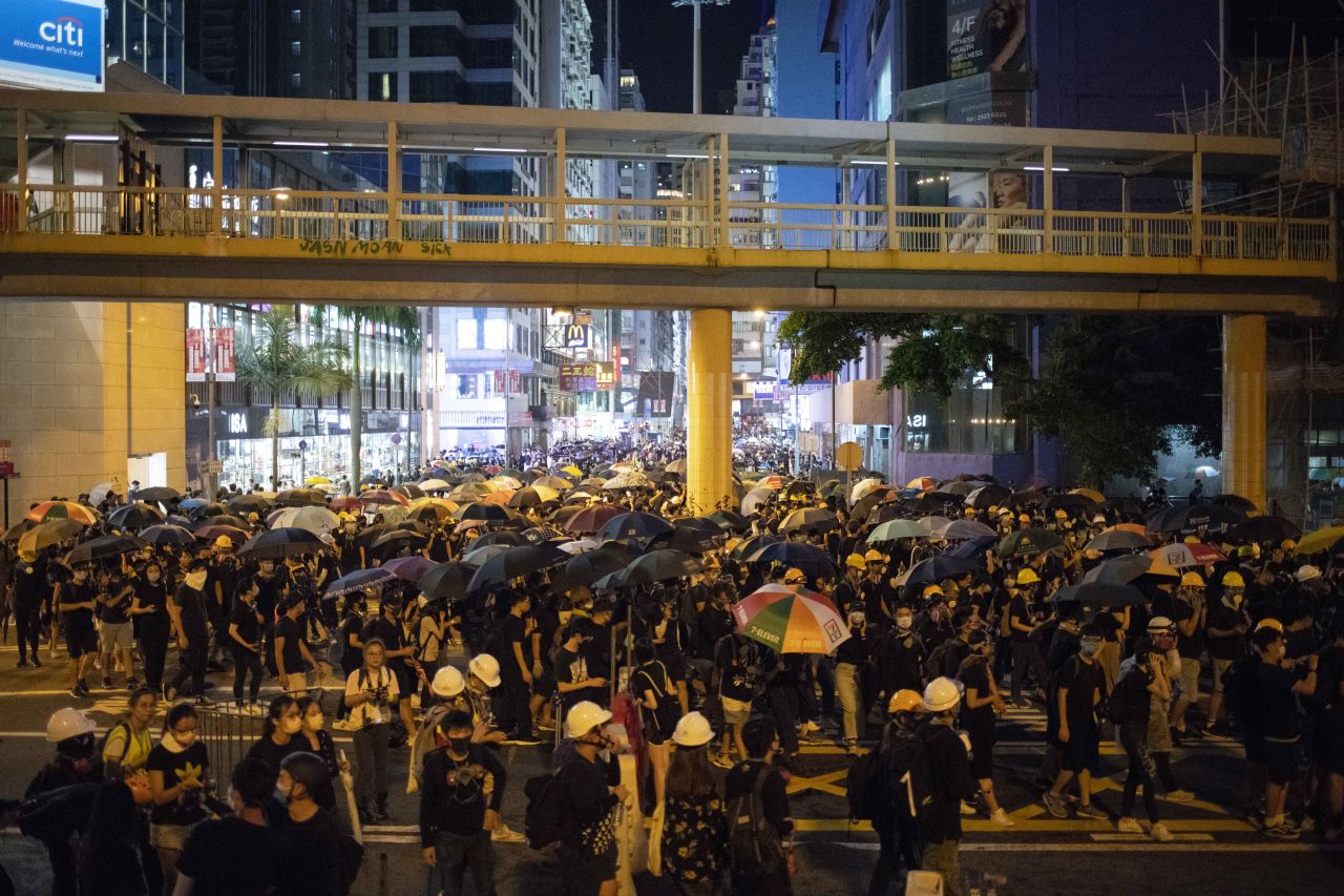 Protesters occupy Causeway Bay, one of Hong Kong's most crowded districts, on Sunday.