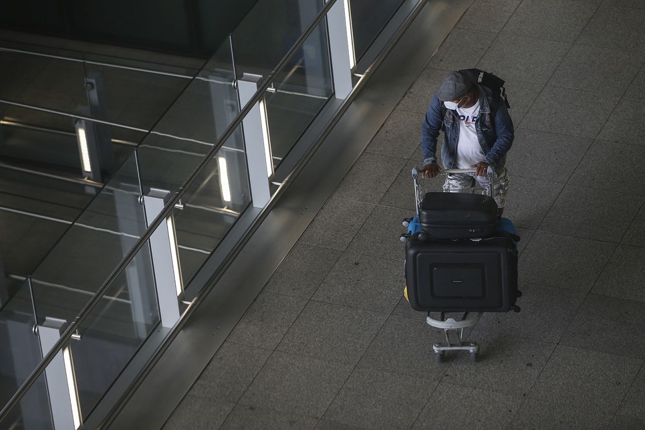 Travellers exit Heathrow Airport Terminal 2 on August 22, 2020 in London, England. 