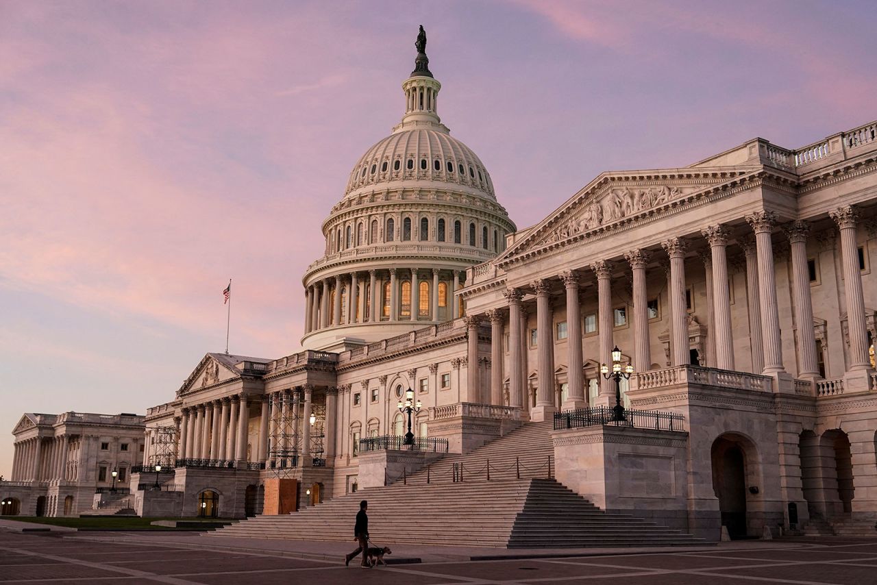 The sun rises at the US Capitol in Washington, DC, on November 8.