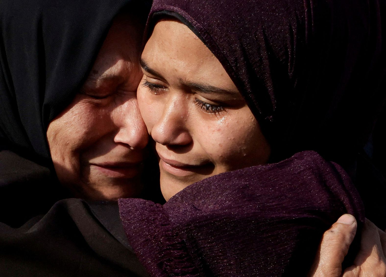 People in Khan Younis, Gaza, attend a funeral Saturday, May 3, for Palestinians who were killed in Israeli strikes.