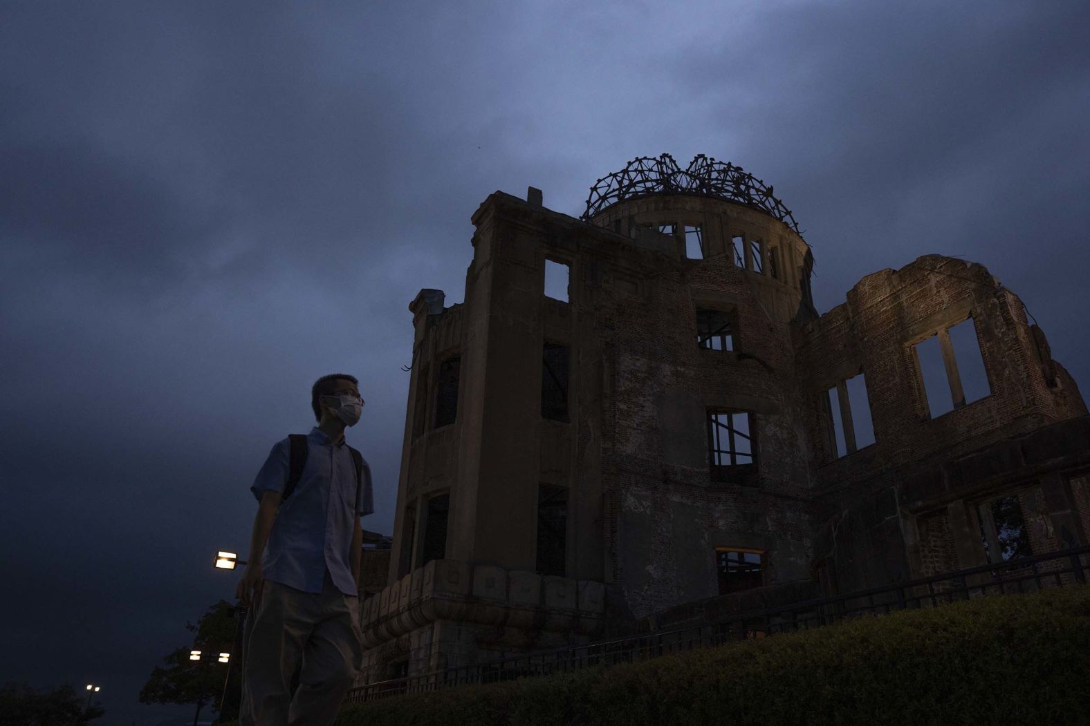 A visitor walks past the Atomic Bomb Dome in Hiroshima, Japan, on Monday, August 4, two days before the 80th anniversary of the WWII US atomic bombings of <a href="index.php?page=&url=https%3A%2F%2Fwww.cnn.com%2F2020%2F08%2F04%2Fworld%2Fgallery%2Fhiroshima-nagasaki-atomic-bomb">Hiroshima and Nagasaki</a>.