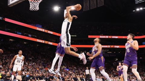 PHOENIX, ARIZONA - NOVEMBER 02: Victor Wembanyama #1 of the San Antonio Spurs slam dunks the ball against Keita Bates-Diop #21 of the Phoenix Suns during the first half of the NBA game at Footprint Center on November 02, 2023 in Phoenix, Arizona. NOTE TO USER: User expressly acknowledges and agrees that, by downloading and or using this photograph, User is consenting to the terms and conditions of the Getty Images License Agreement. (Photo by Christian Petersen/Getty Images)