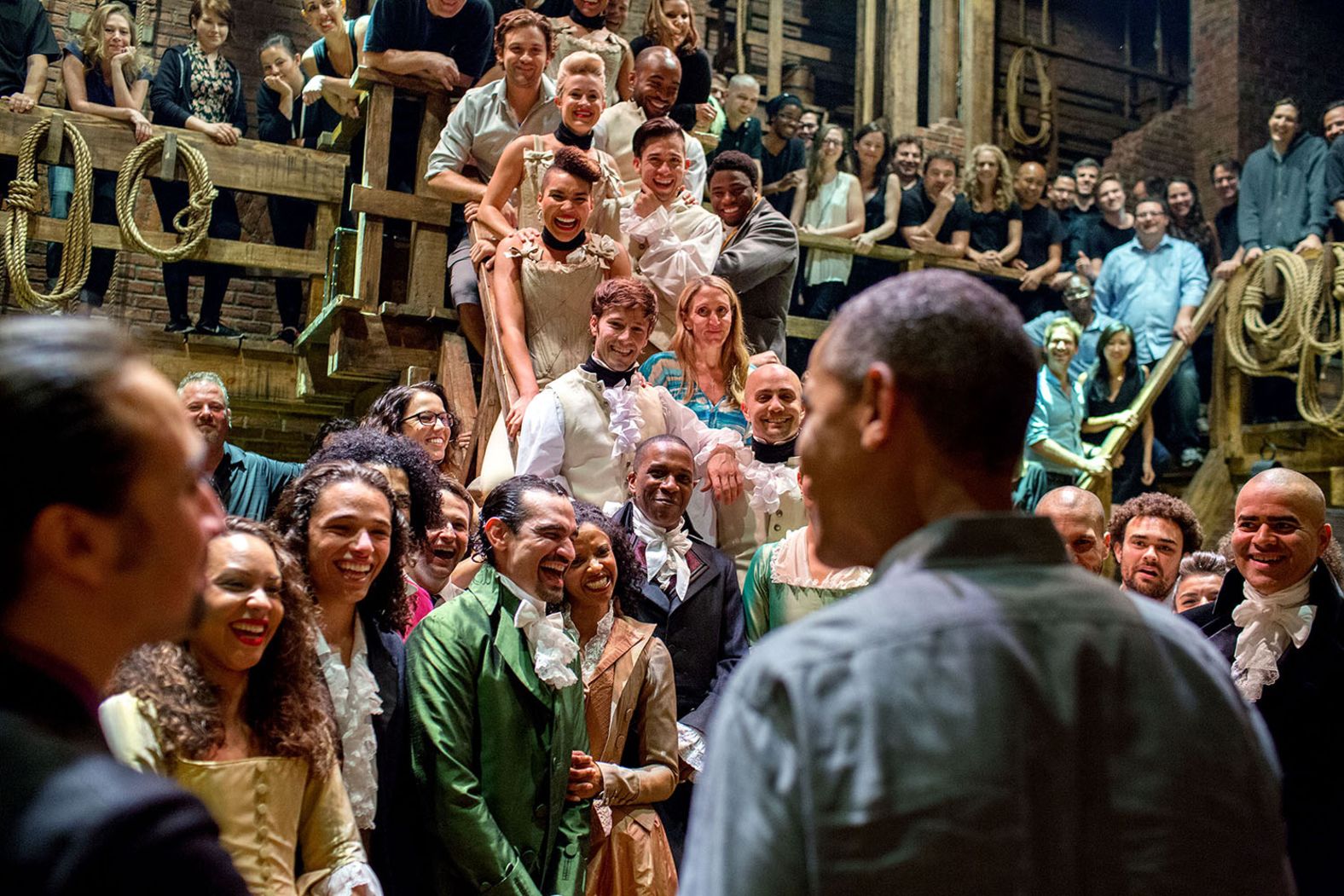 President Barack Obama greets the cast and crew after seeing the play with his daughters in July 2015.