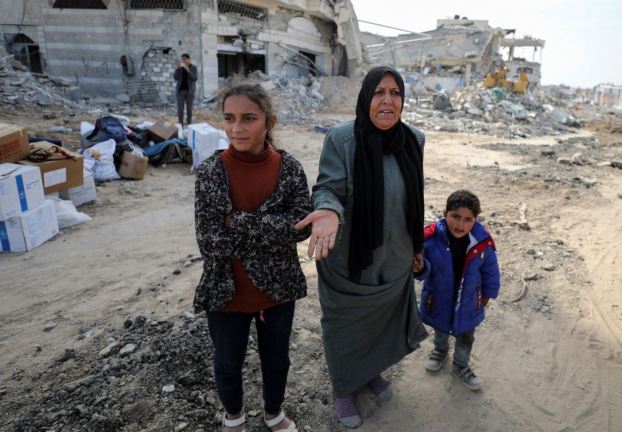 A Palestinian woman reacts as she returns to her destroyed house in Jabalia on Sunday.