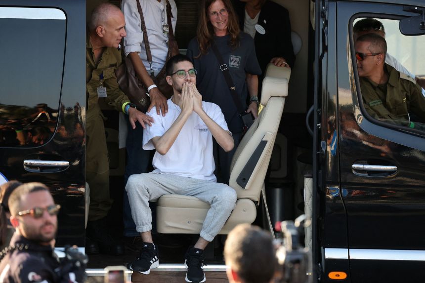 Released hostage Evyatar David, who was kidnapped during the deadly October 7, 2023 attack by Hamas and taken to Gaza, reacts upon arrival at the site of Rabin Medical Center-Beilinson Hospital, in Petah Tikva, Israel, on October 13, 2025.