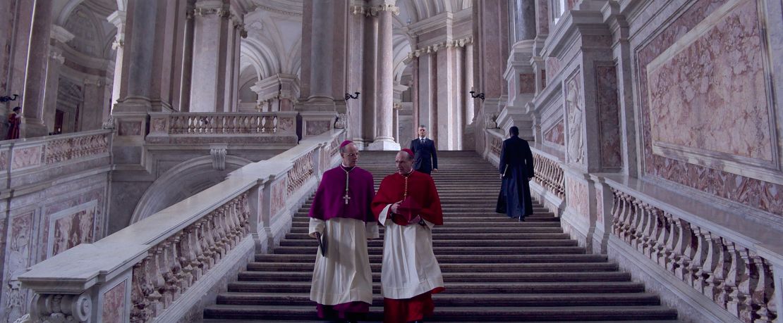 Brían F. O'Byrne as Cardinal O'Malley (L) and Ralph Fiennes as Cardinal Lawrence (R) in the movie 