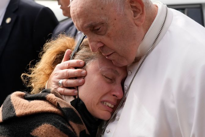 Pope Francis consoles Serena Subania, whose 5-year-old daughter, Angelica, died the day before he left a hospital in Rome in April 2023. He was discharged after receiving treatment for bronchitis, the Vatican said.