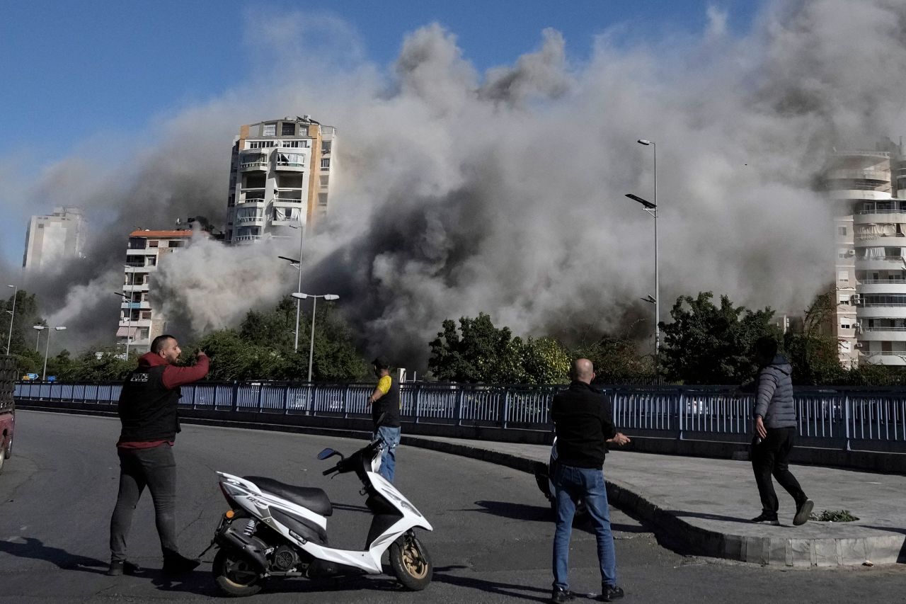 Smoke rises from the building.