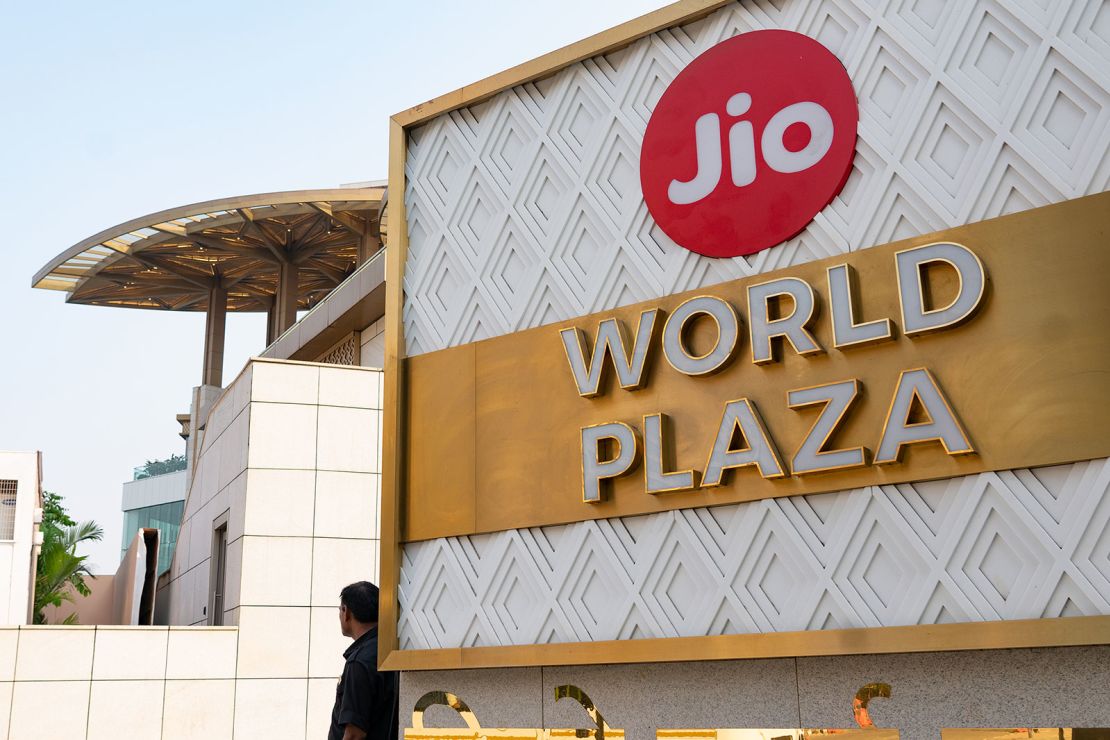 A guard stands outside the Jio World Plaza, a luxury mall from Ambani's Reliance Industry, in Mumbai on April 16, 2024.