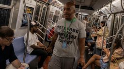 NEW YORK, NY — Henry Thomas and his son Carl Thomas distribute food in the New York City subway system on July 25, 2024.

Photo by Julian Rigg/CNN