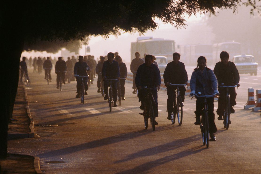 People bike to work in Beijing in October 1981.