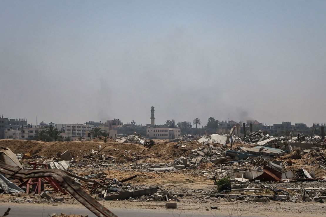 Smoke billows over buildings flattened by Israeli strikes, in Bureij refugee camp, central Gaza, on June 5. Aid agencies told CNN that bombardment disrupts critical relief operations in the strip.