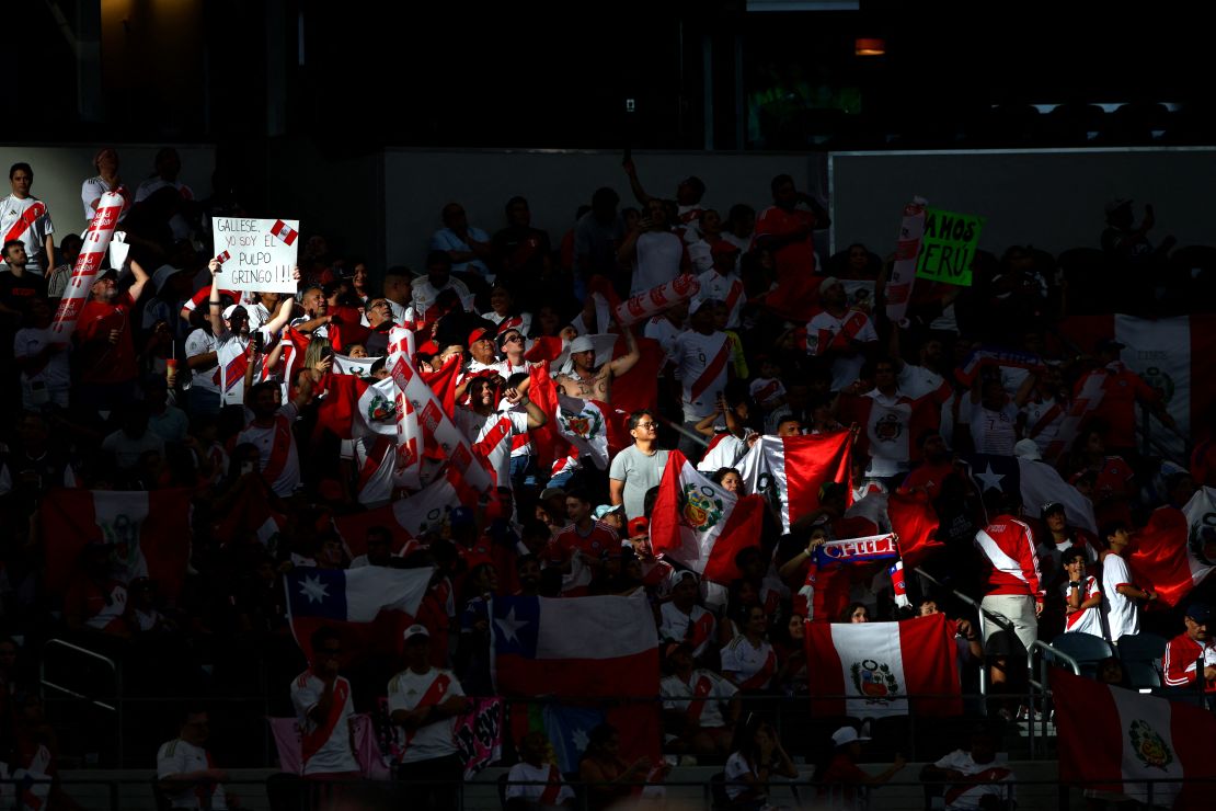 Peru's supporters cheer during a match between Peru and Chile at AT&T Stadium in Arlington, Texas, on June 21.