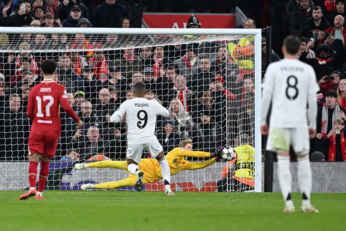 Liverpool's keeper Caoimhin Kelleher saves a penalty from Mbappé on November 27.