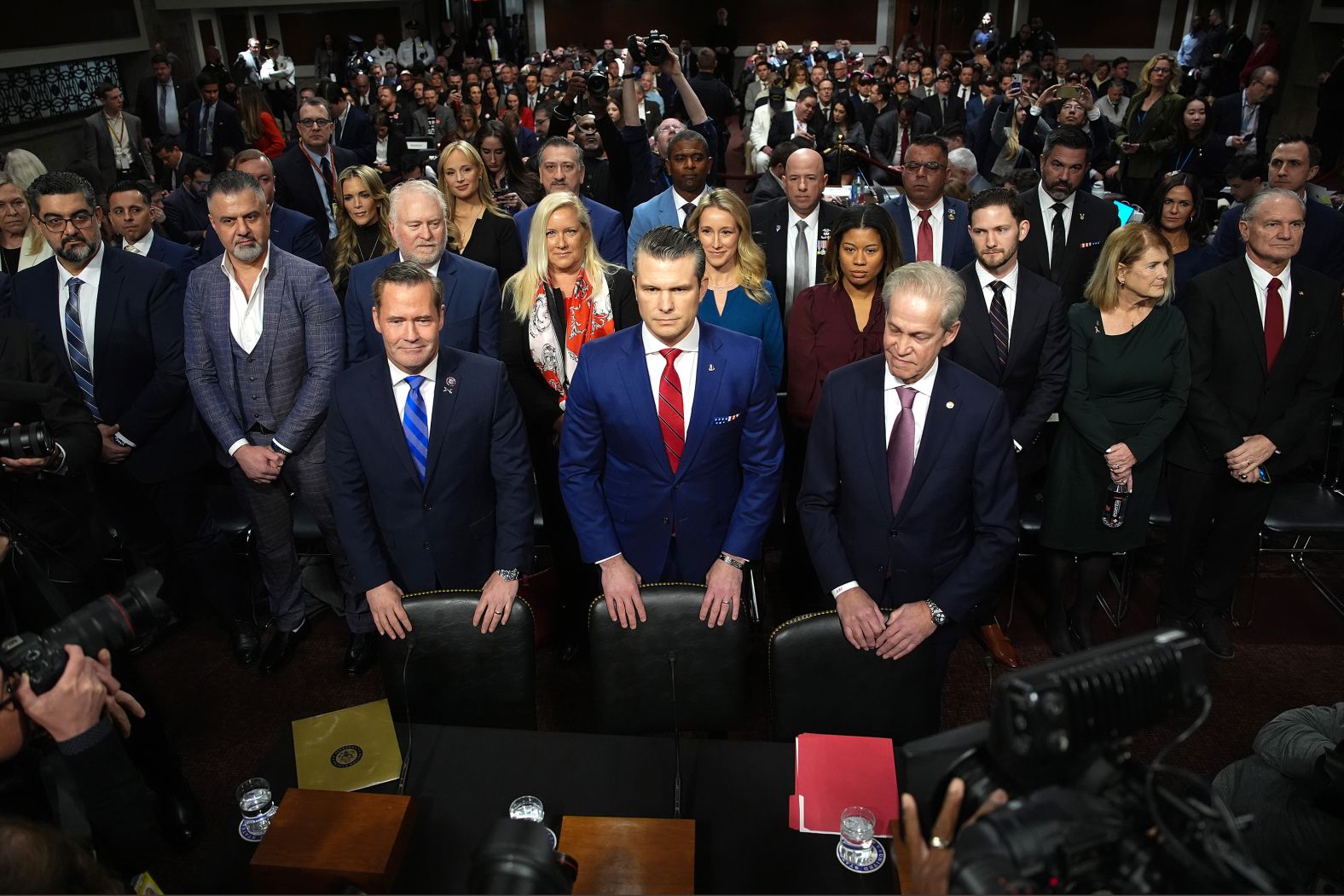 Pete Hegseth, Donald Trump’s nominee to lead the Pentagon, stands front and center as he attends <a href="index.php?page=&url=https%3A%2F%2Fwww.cnn.com%2F2025%2F01%2F14%2Fpolitics%2Ftakeaways-pete-hegseth-confirmation-hearing%2Findex.html">his confirmation hearing</a> in Washington, DC, on Tuesday, January 14. During his hearing, Hegseth said he is “not a perfect person” but was defiant in the face of multiple allegations surrounding his past conduct.