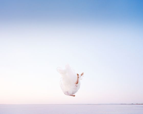 "Wedding Dress Salt, 2023." Photographer Scarlett Hooft Graafland has described using landscape as a stage for a performance or installation. Her carefully choreographed, site-specific sculptural interventions and performances take place in some of the most remote corners of the earth.