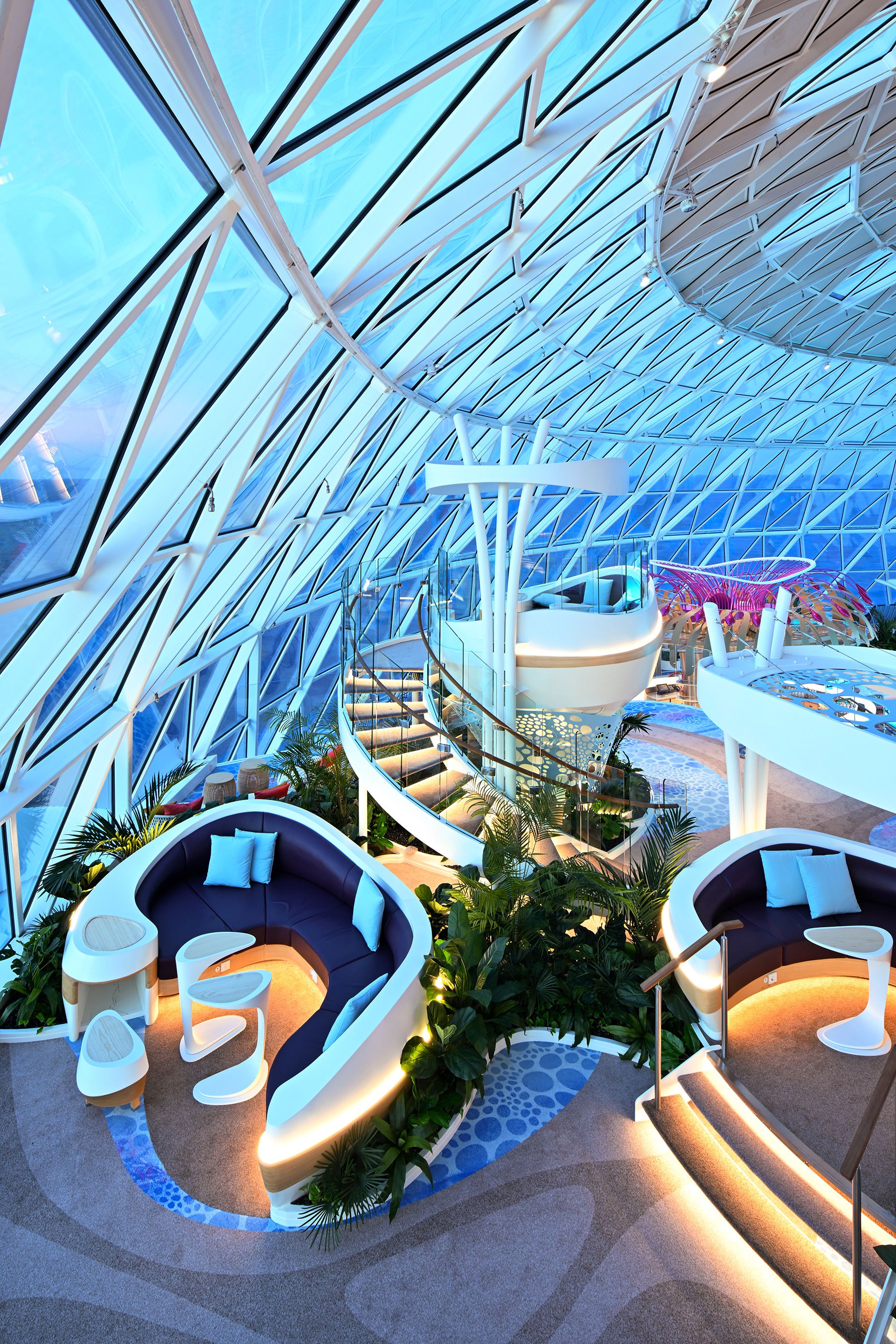 The Overlook Lounge, located inside the 82-foot-tall steel and glass AquaDome that crowns part of the top of the ship, has elevated seating pods.