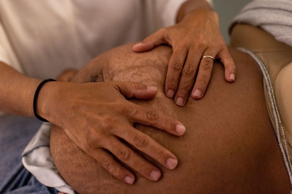 Hinman examines Kountz during her November appointment. Kountz is due to have her sixth baby in January.