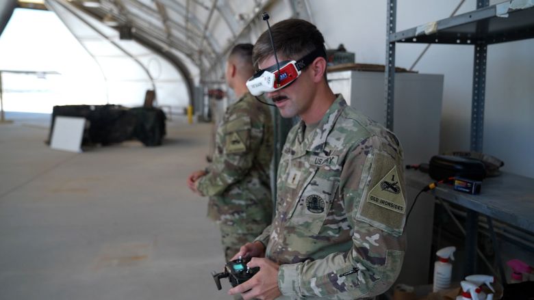 A solider practices with a first-person view drone at Fort Bliss.