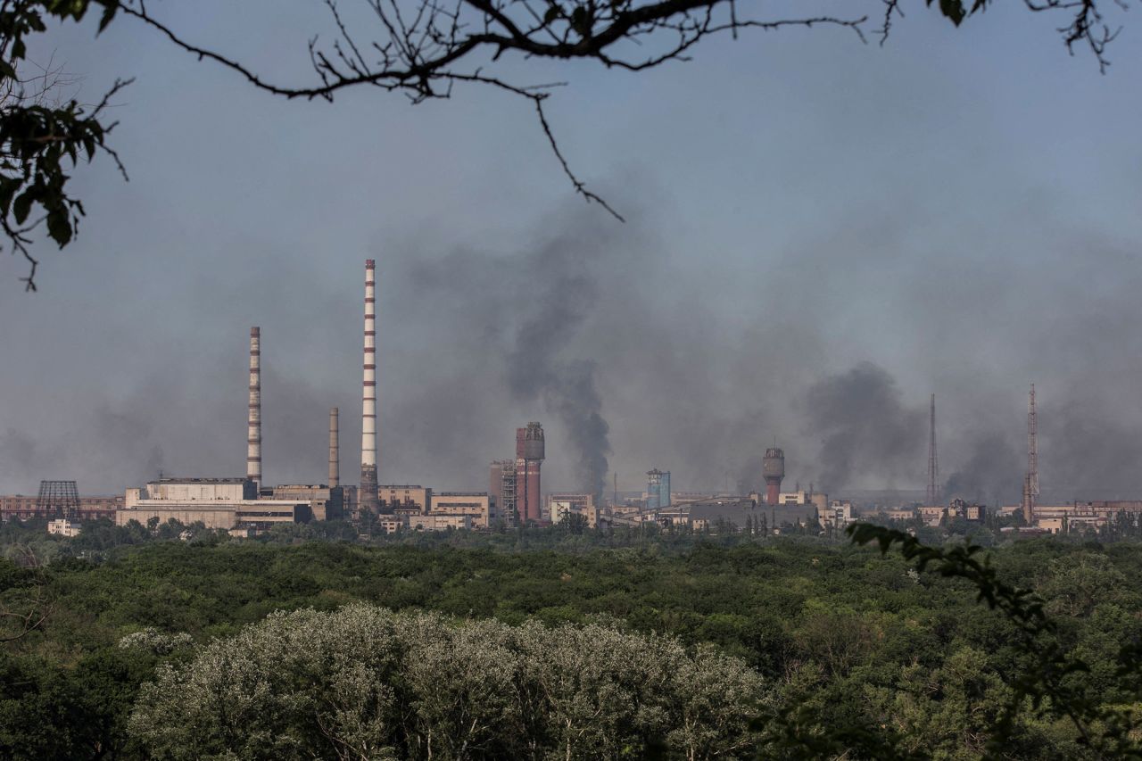 Smoke rises after a military strike on a compound of Severodonetsk's Azot Chemical Plant, Luhansk region, Ukraine, on June 10.