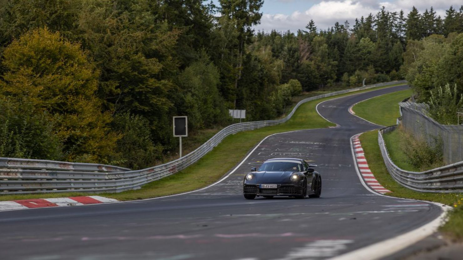 A hybrid Porsche 911 undergoes track testing.