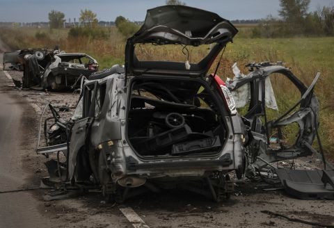 Several destroyed civilian cars are seen on a road near the town of Balakliia, Ukraine in Kharkiv region on September 13.