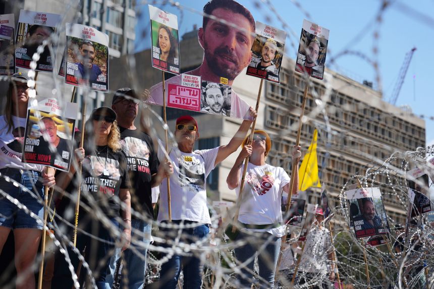 Families of hostages protest, demanding their release from Hamas captivity in the Gaza Strip, at the plaza known as the hostages square in Tel Aviv, Israel, Saturday, Aug. 2, 2025.