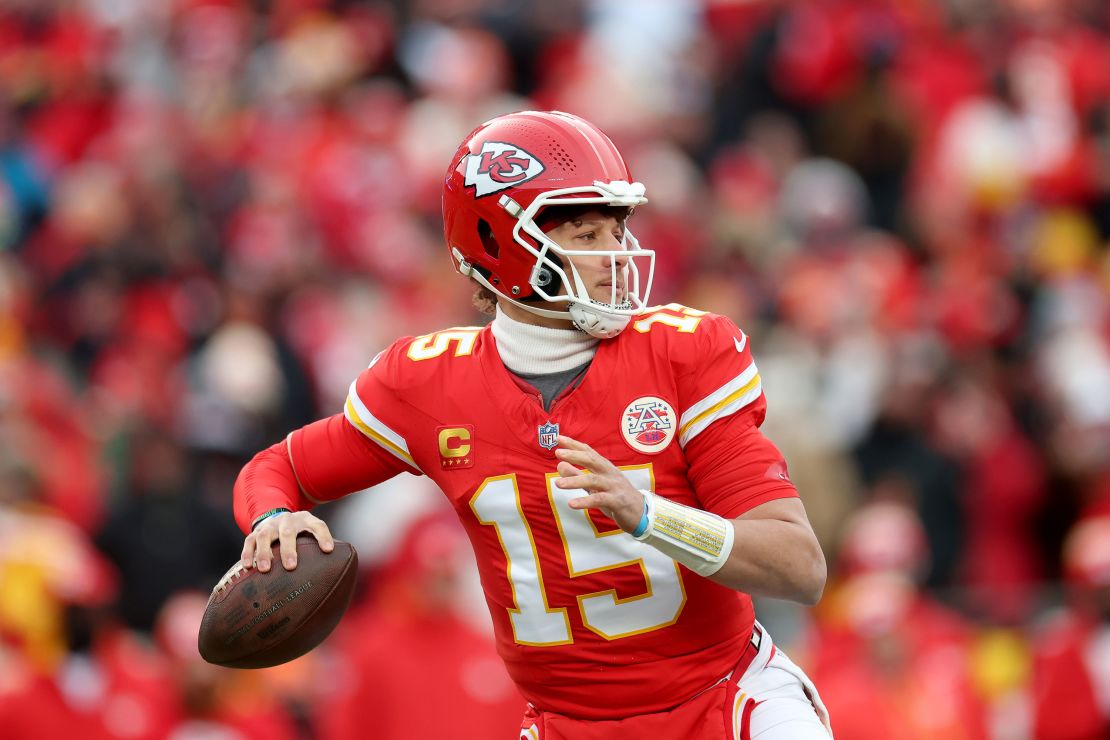 Kansas City Chiefs quarterback Patrick Mahomes looks to pass against the Houston Texans during the first quarter in the AFC Divisional Playoff.