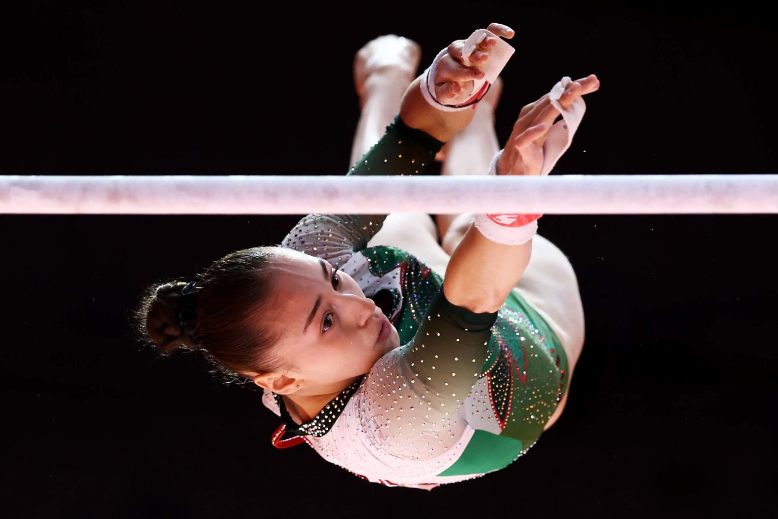 Algerian gymnast Kaylia Nemour competes on the uneven bars during the World Championships in Jakarta, Indonesia, on Friday, October 24. <a href="index.php?page=&url=https%3A%2F%2Fwww.olympics.com%2Fen%2Fnews%2F2025-artistic-gymnastics-world-championships-kaylia-nemour-makes-history-first-ever-world-gymnastics-champion" target="_blank">She won the event</a>, making her the first gymnast from Africa to become a world champion. She also won the event at the Olympics last year.