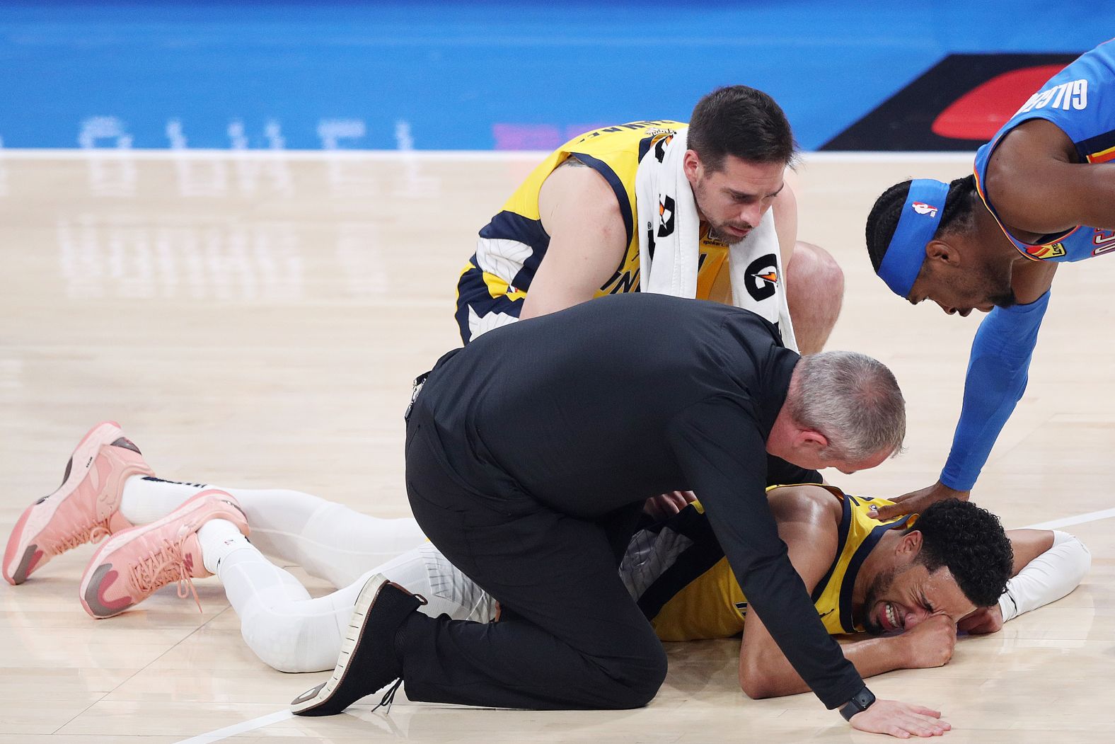Indiana Pacers star Tyrese Haliburton grimaces after going down with an injury in Game 7 of the NBA Finals on Sunday, June 22. <a href="index.php?page=&url=https%3A%2F%2Fwww.cnn.com%2F2025%2F06%2F23%2Fsport%2Ftyrese-haliburton-torn-achilles-spt">He tore his right Achilles tendon</a> during the first quarter.