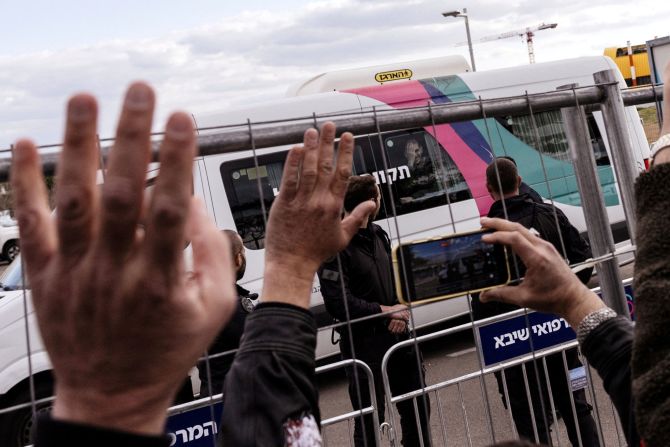 Released Israeli hostage Eli Sharabi reacts from behind a window as people greet him at a medical center in Ramat Gan, Israel, on Saturday, February 8. Three Israeli hostages and 183 Palestinian prisoners were freed in the <a href="https://www.cnn.com/2025/02/07/middleeast/hamas-hostage-release-israel-intl/index.html">fifth round of exchanges</a> between Israel and Hamas on Saturday. But the <a href="https://www.cnn.com/2025/02/08/middleeast/hostages-release-fifth-round-israel-hamas-ceasefire-intl-hnk/index.html">gaunt, frail appearance of the released hostages</a> was condemned as “shocking” by Israel.