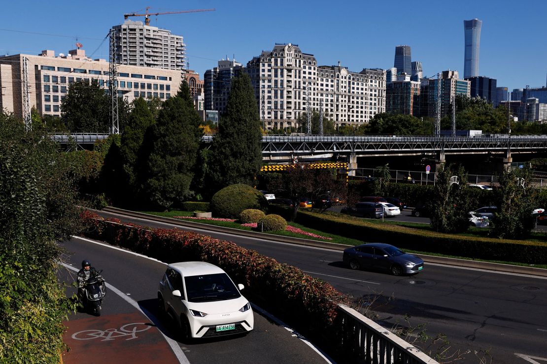 A BYD electric vehicle drives on a Beijing street in October 2023.