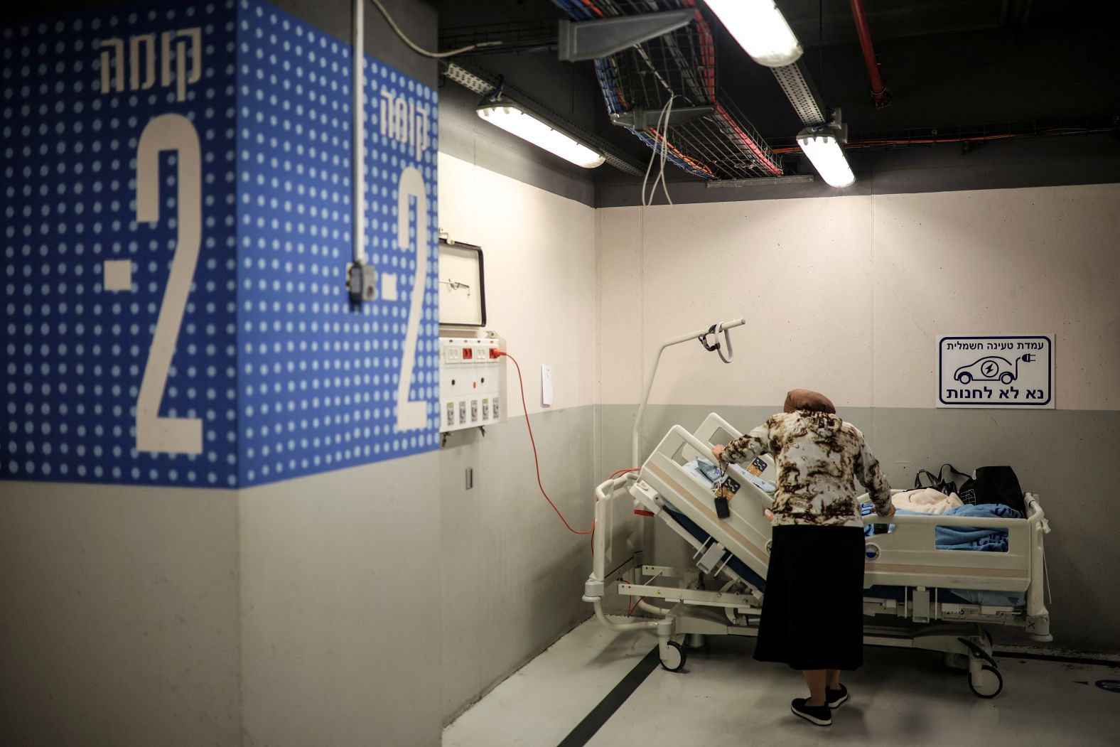 A patient is tended to inside the sheltered parking facility of the Sourasky Medical Center in Tel Aviv. The country was bracing for Iran's retaliation.