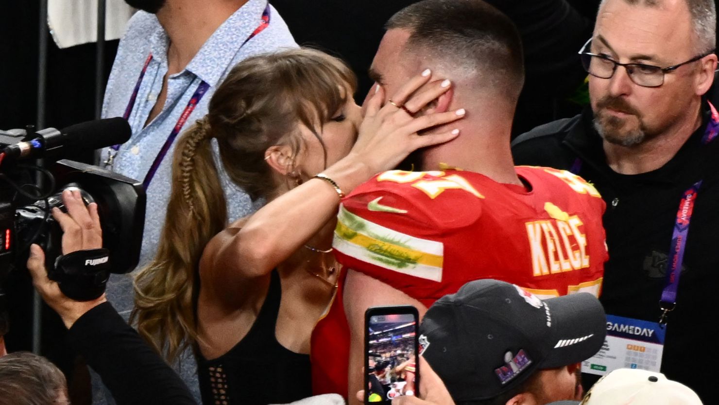 Taylor Swift kisses Kansas City Chiefs' tight end Travis Kelce after the Chiefs won Super Bowl LVIII against the San Francisco 49ers at Allegiant Stadium in Las Vegas, Nevada on February 11, 2024.