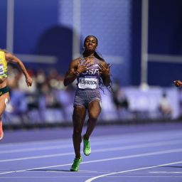 US' Sha'Carri Richardson (C) crosses the finish line to win past Australia's Bree Masters and Canada's Jacqueline Madogo in the women's 100m heat of the athletics event at the Paris 2024 Olympic Games at Stade de France in Saint-Denis, north of Paris, on August 2, 2024. (Photo by Jewel SAMAD / AFP)