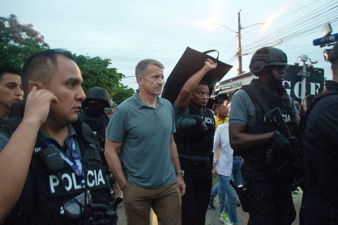 Blackwater Founder Erik Prince walks with police members during 'Apolo 13' Anti-Crime Operation on April 5, 2025, in Guayaquil, Ecuador.
