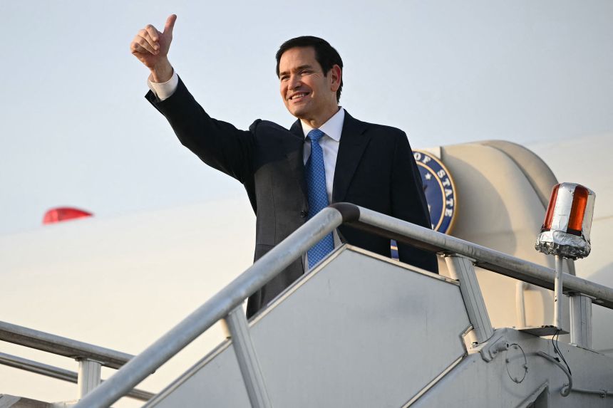 Secretary of State Marco Rubio boards his flight before departing from Subang Air Base, on the outskirts of Kuala Lumpur, on July 11, 2025.