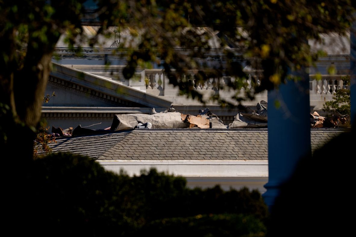 Debris is seen on the roof of the East Wing on October 21.