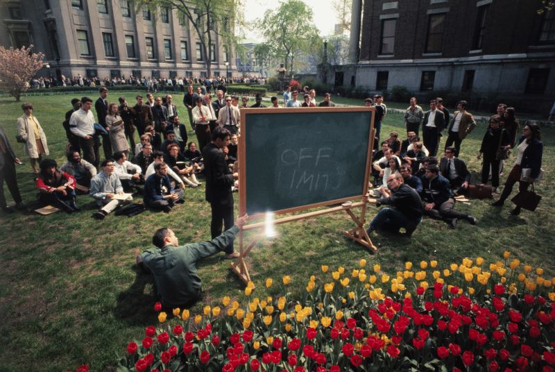 Professor Stephen Smale of Berkeley, a guest lecturer in Topology and Structural Stability, holds a class in front of Columbia's University's Low Memorial Library. The library, at left rear, and the mathematics building, right, were both held by student demonstrators.